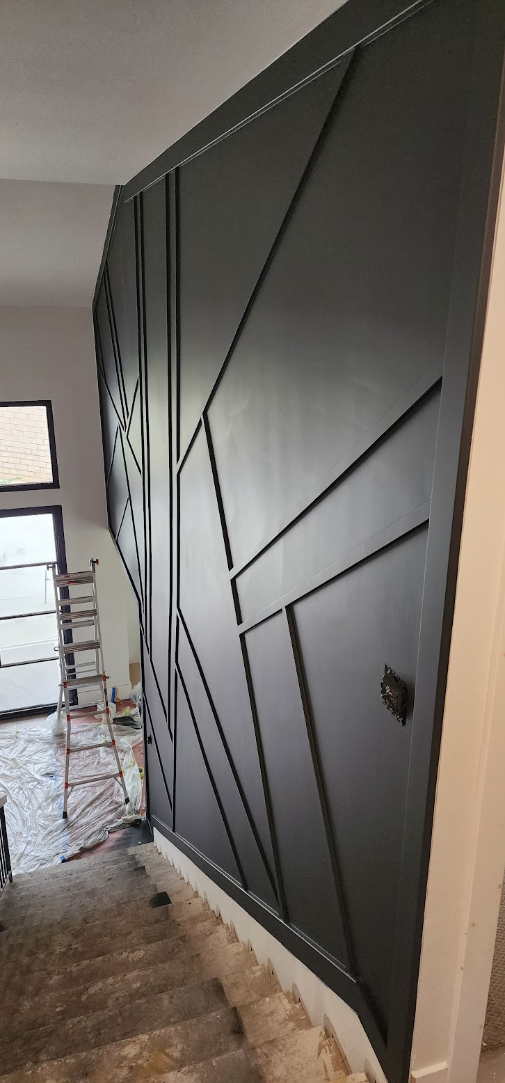 Modern feature wall detail along stairway